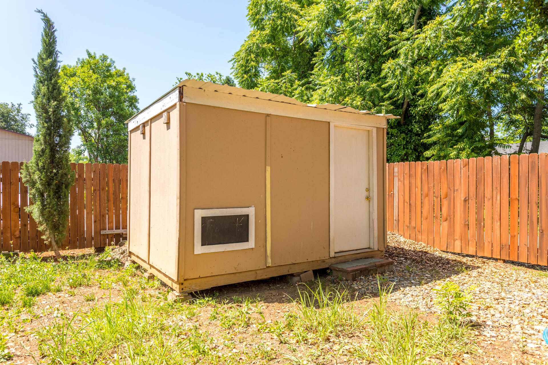 1116 Layton Road Redding, CA 96002 - Photo 11 of 11 a view of a storage house and a yard