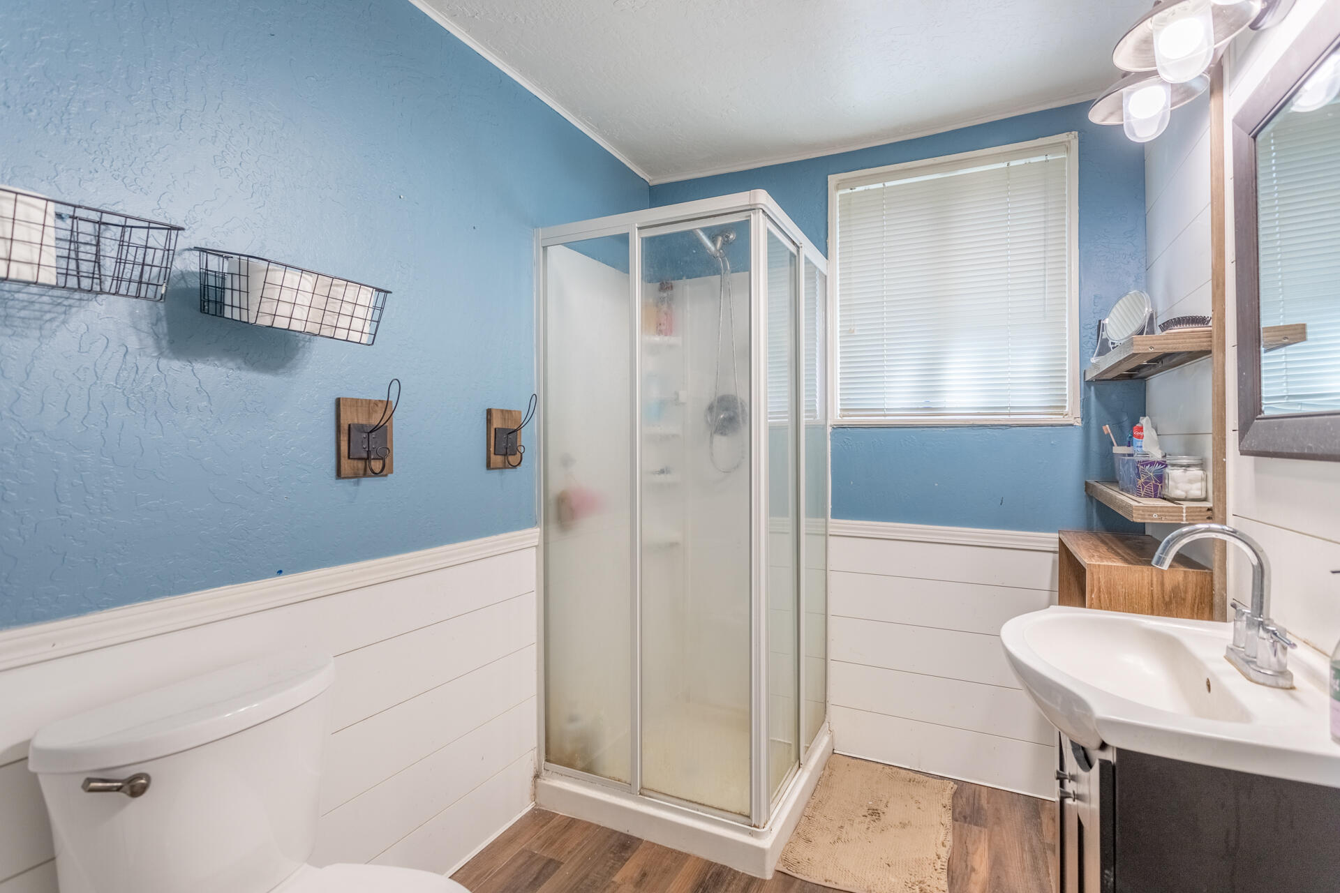 1116 Layton Road Redding, CA 96002 - Photo 5 of 11 a bathroom with a sink and a shower
