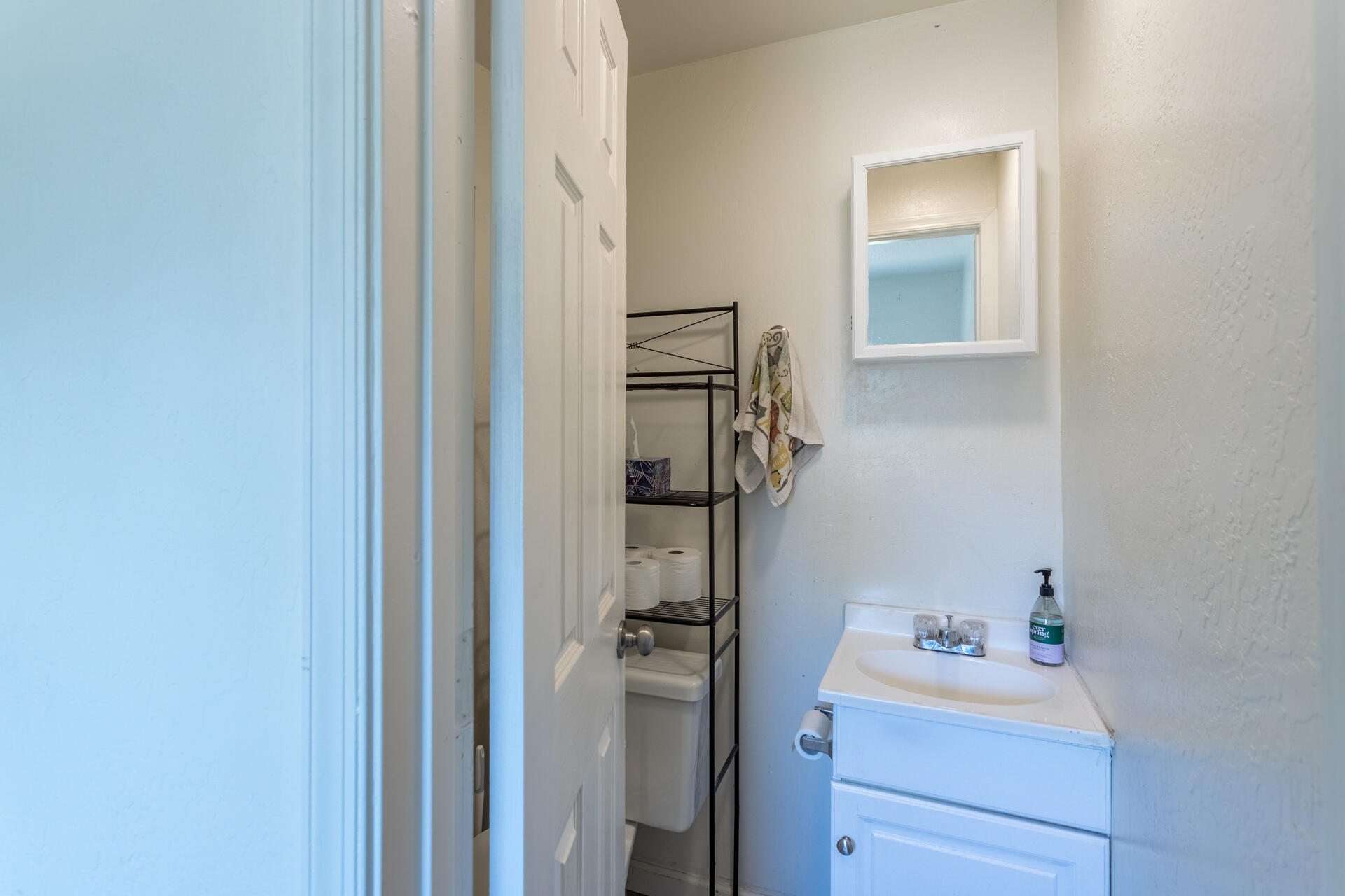 1116 Layton Road Redding, CA 96002 - Photo 6 of 11 a bathroom with a sink toilet and vanity