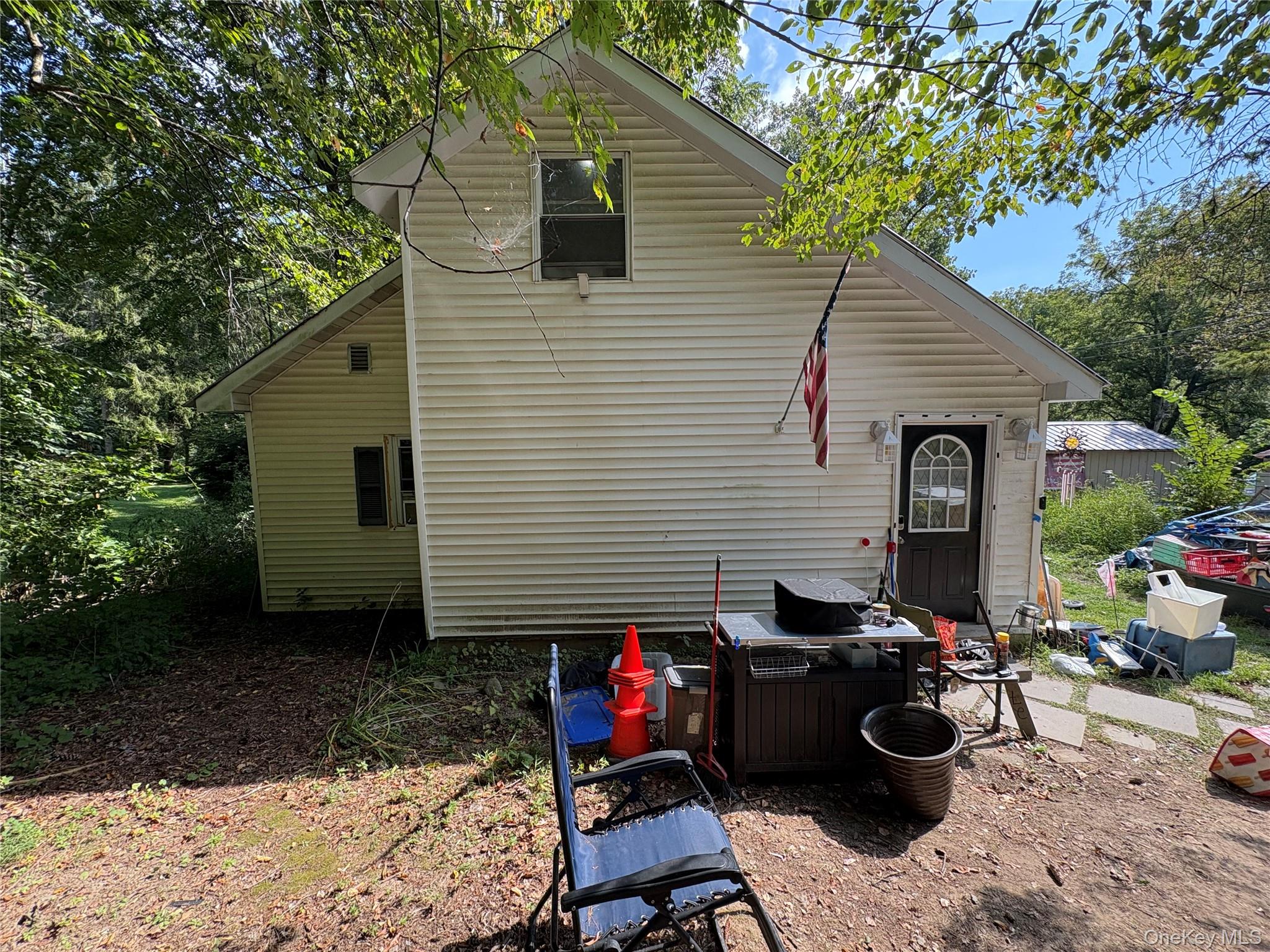 Rear view of house with a patio area