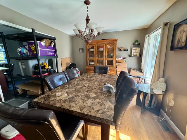 a living room with fireplace furniture and a flat screen tv