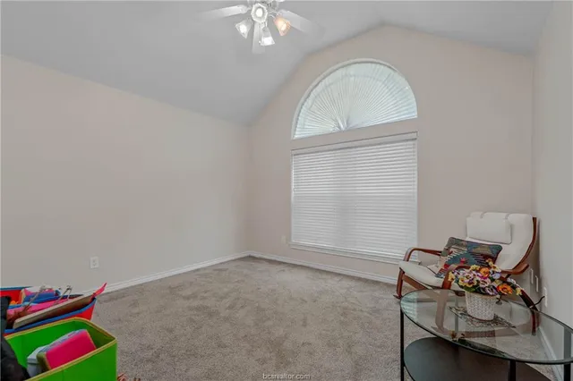 a room with furniture and a window