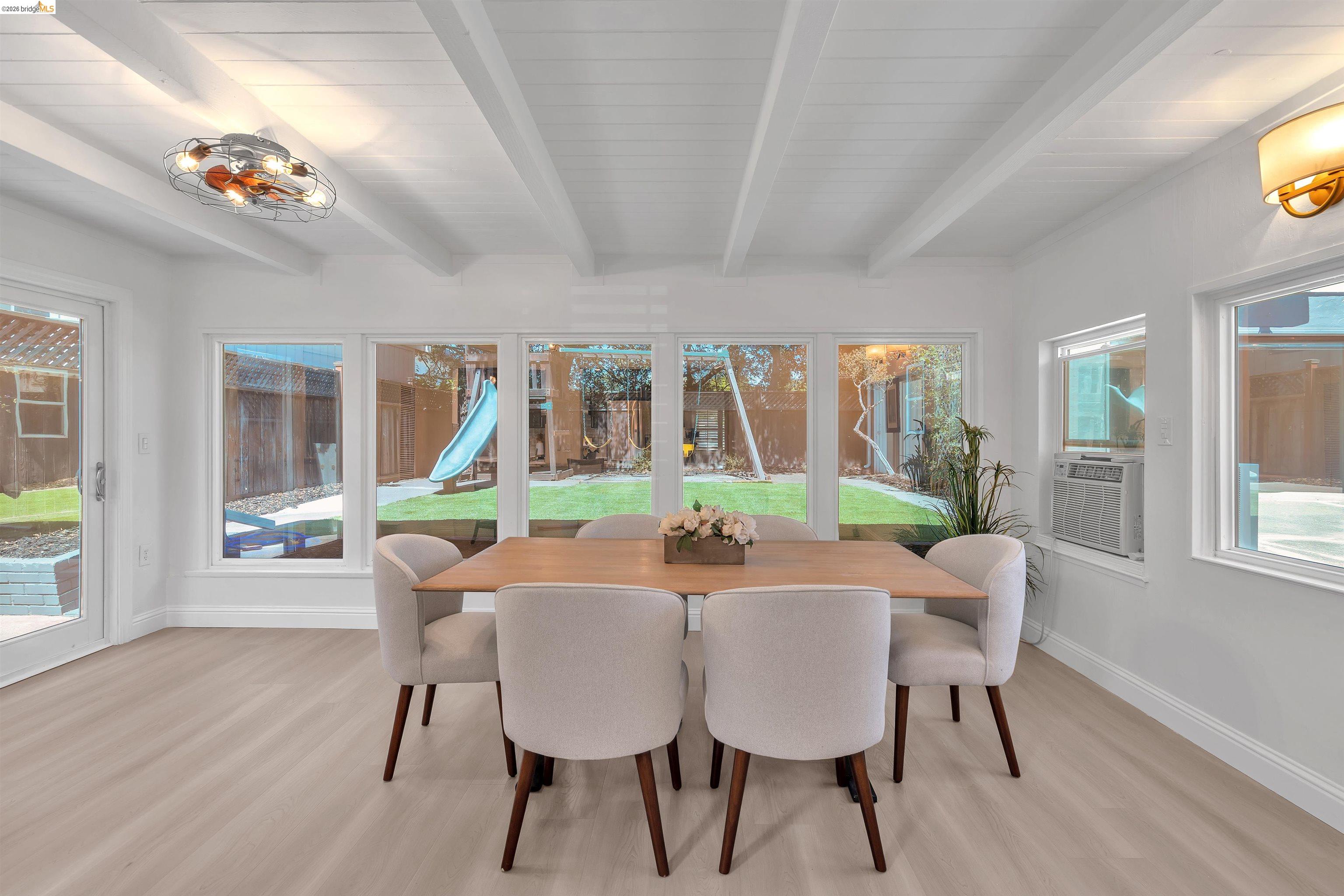 4352 Gem Avenue Castro Valley, CA 94546 - Photo 14 of 31 a view of a dining room with furniture window and wooden floor