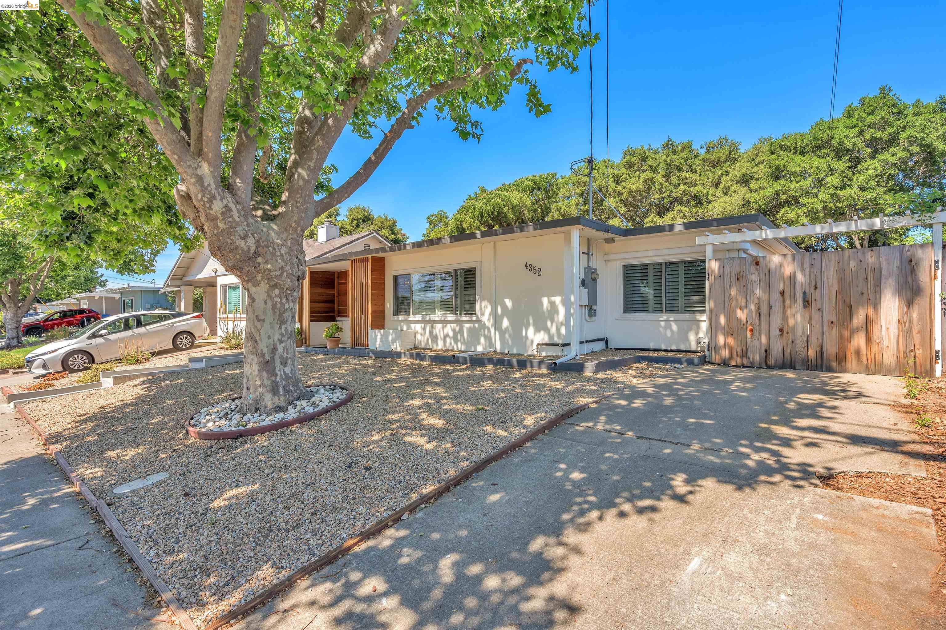 4352 Gem Avenue Castro Valley, CA 94546 - Photo 2 of 31 a front view of a house with garden