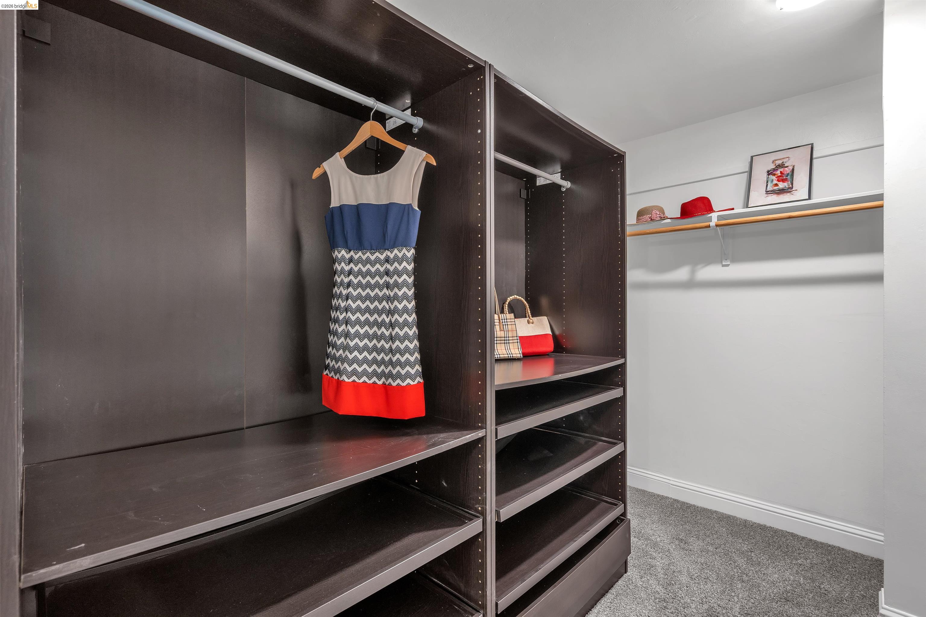 4352 Gem Avenue Castro Valley, CA 94546 - Photo 21 of 31 a view of walk in closet with clothes and shoes