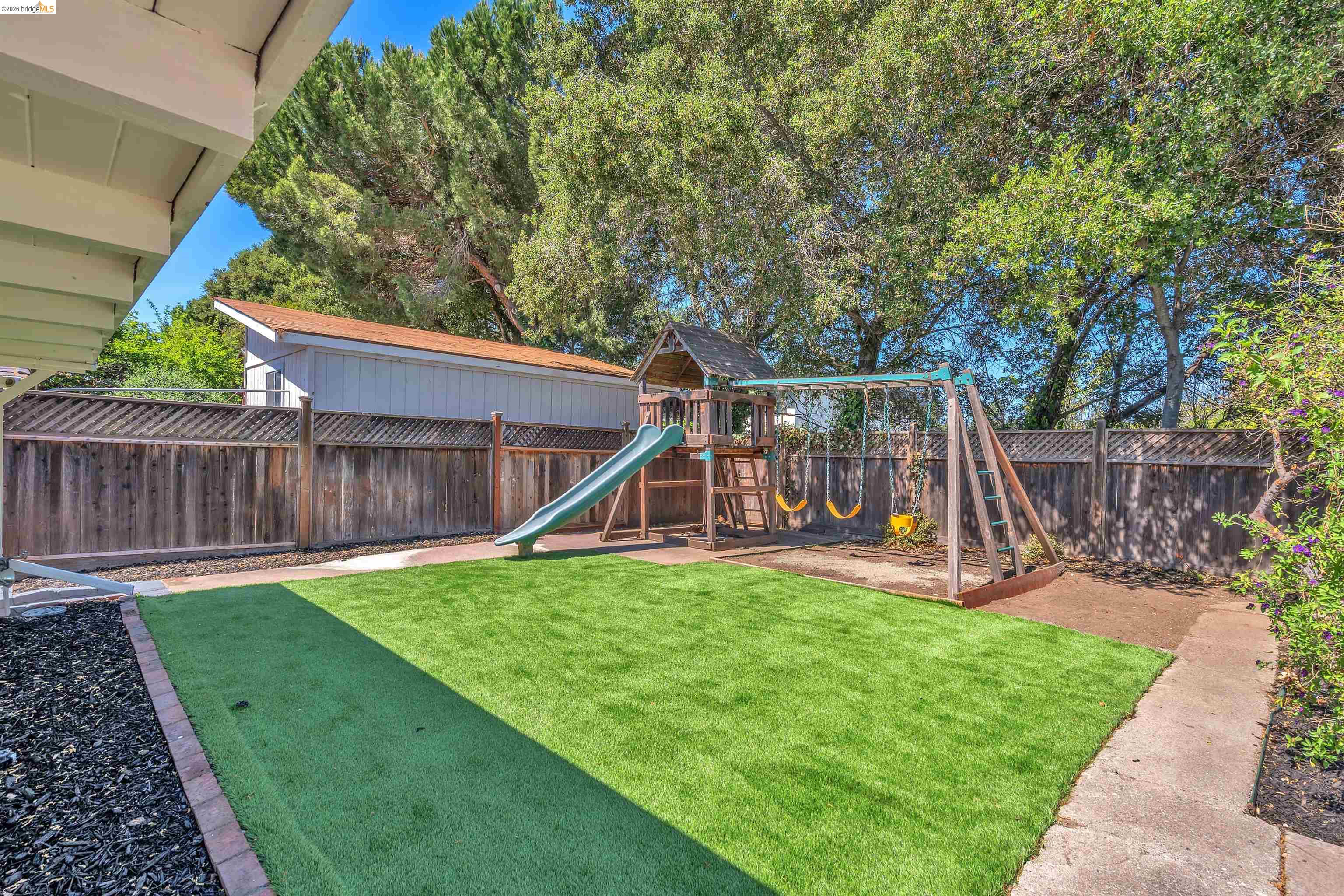 4352 Gem Avenue Castro Valley, CA 94546 - Photo 24 of 31 a view of a house with a yard and a slide