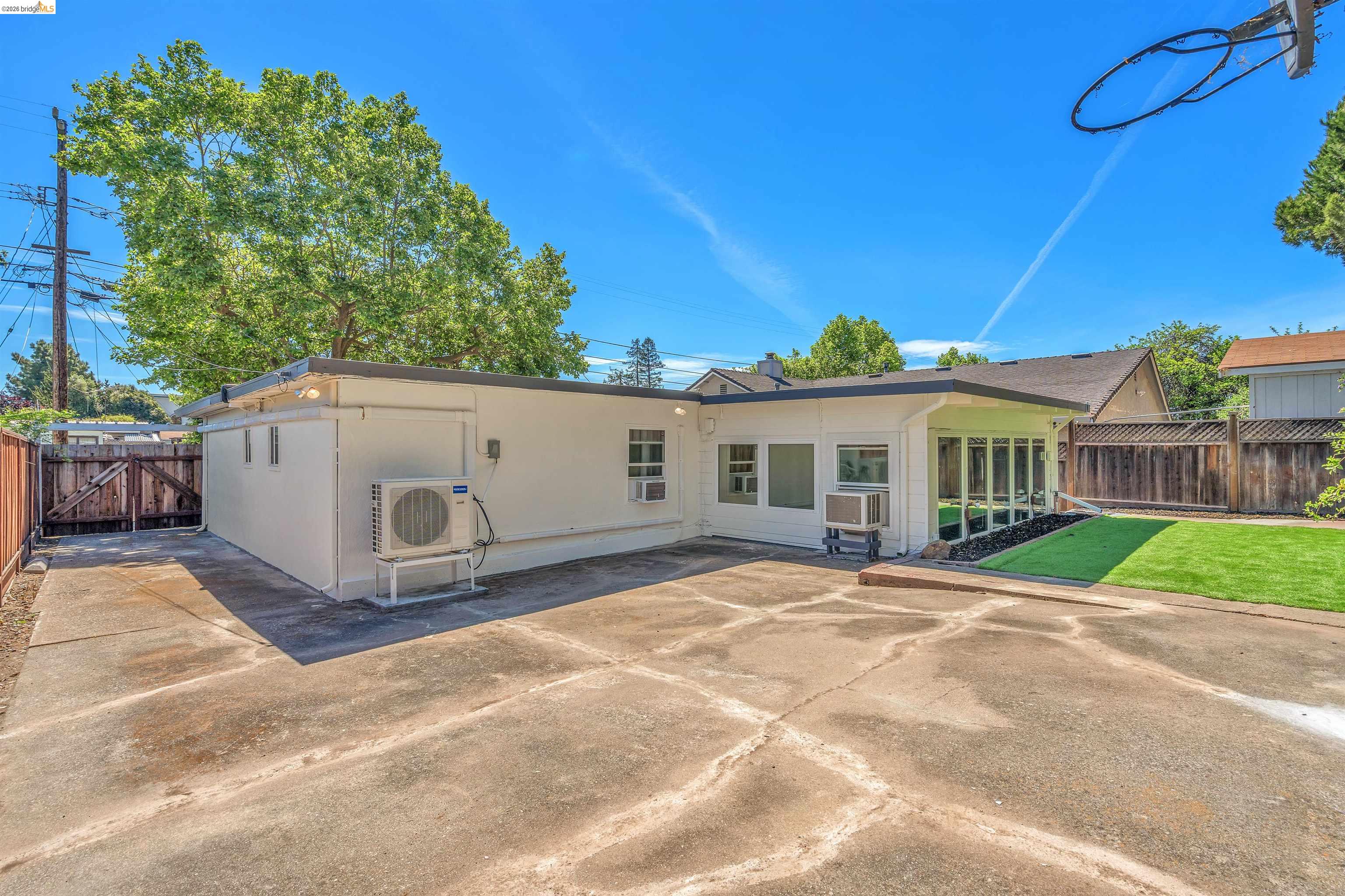 4352 Gem Avenue Castro Valley, CA 94546 - Photo 30 of 31 a view of a white house with a yard