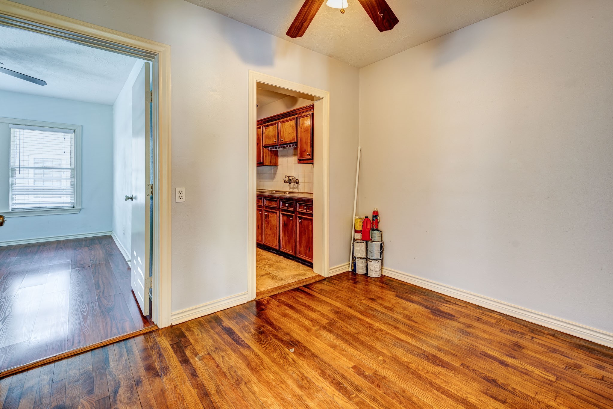122 North Street Houston, TX 77009 - Photo 10 of 11 an empty room with wooden floor and closet