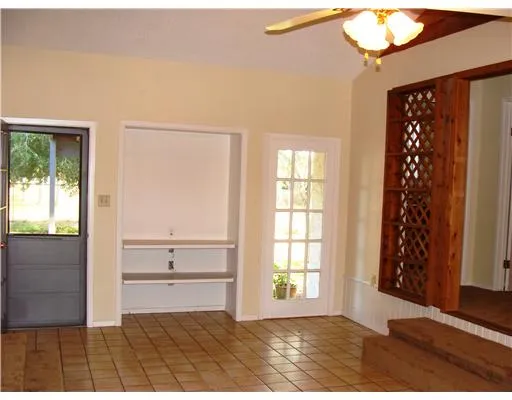 a view of a small space with a fan