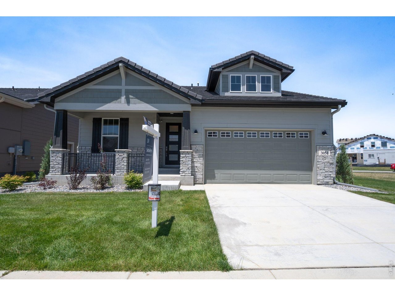 3051 Newfound Lk Road Berthoud, CO 80513 - Photo 2 of 36 a front view of a house with a yard