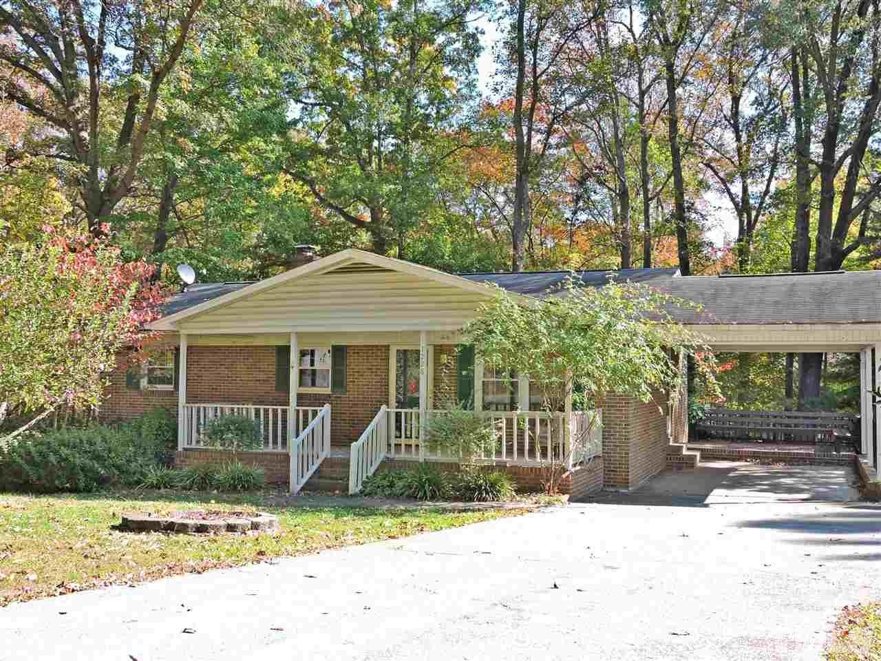 1228 Dover Street Roxboro, NC 27573 - Photo 1 of 11 front view of a house with a yard