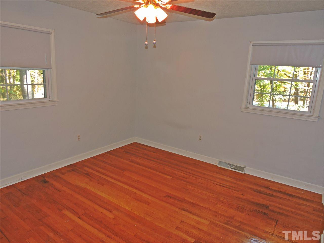 1228 Dover Street Roxboro, NC 27573 - Photo 3 of 11 a view of empty room with window
