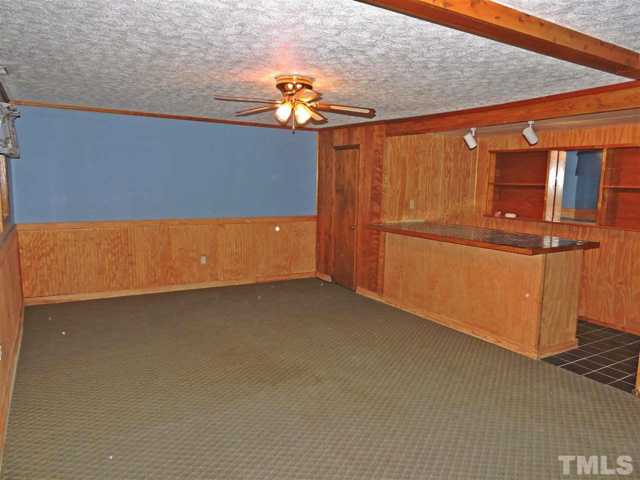 1228 Dover Street Roxboro, NC 27573 - Photo 7 of 11 a room with table and chairs