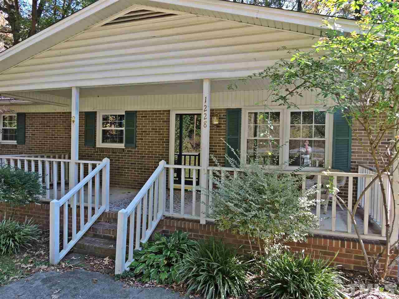 1228 Dover Street Roxboro, NC 27573 - Photo 10 of 11 front view of a house with a porch