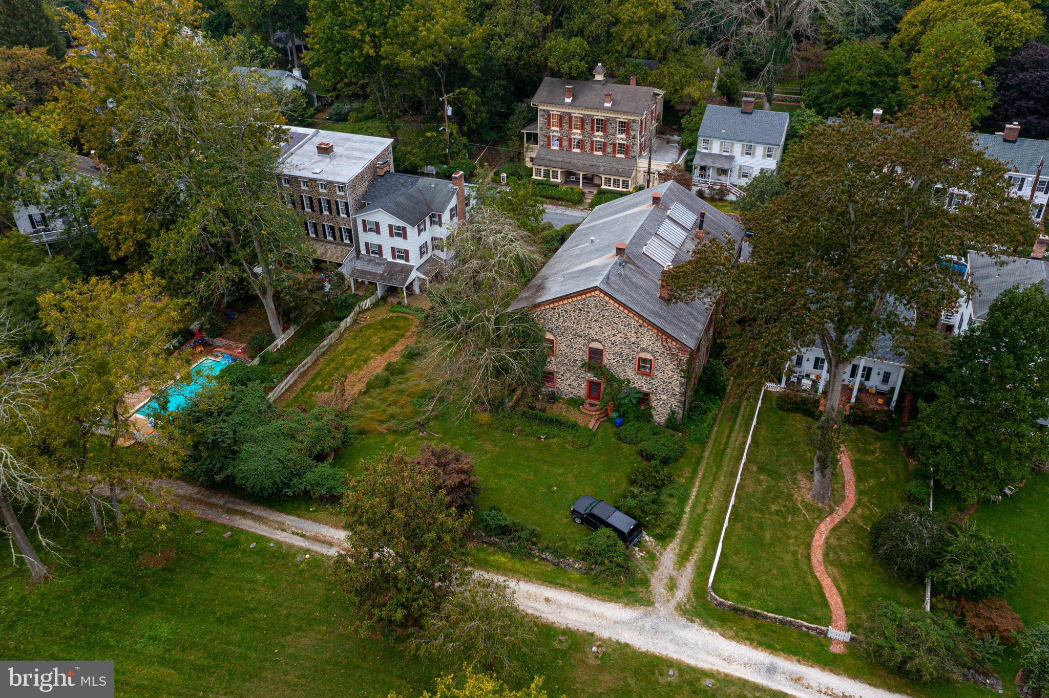 2423 Pickwick Road Baltimore, MD 21207 - Photo 14 of 34 an aerial view of residential house with outdoor space and trees all around