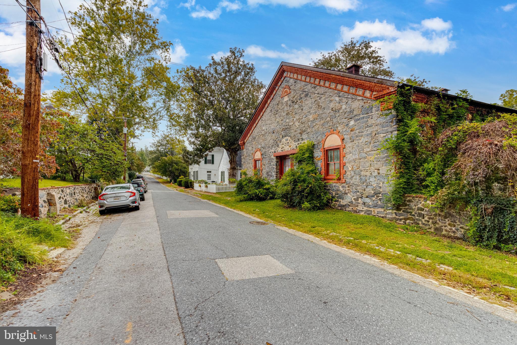 2423 Pickwick Road Baltimore, MD 21207 - Photo 25 of 34 a view of house with outdoor space and parking