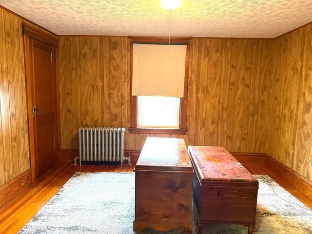 a kitchen with a sink and a stove top oven