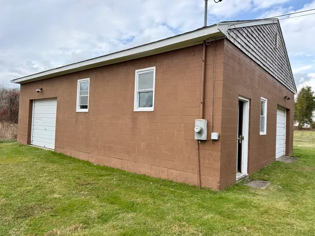 a backyard of a house with lots of green space