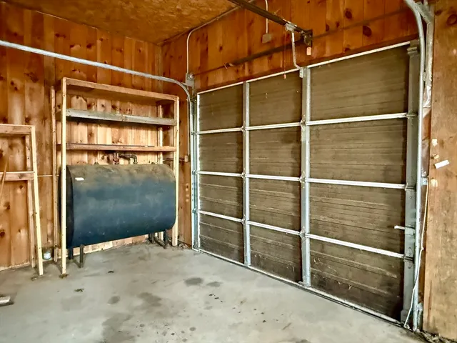 a view of a glass door with wooden floor