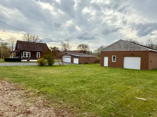 a view of a house with a big yard