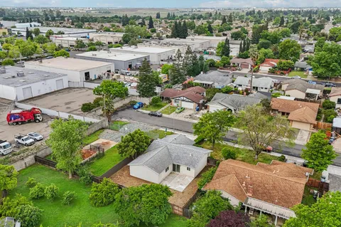 an aerial view of a city with lots of residential buildings