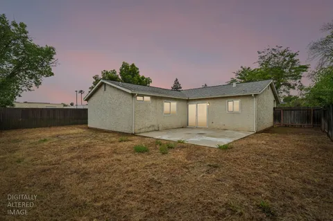 a view of backyard of house