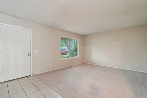 a view of an empty room with window