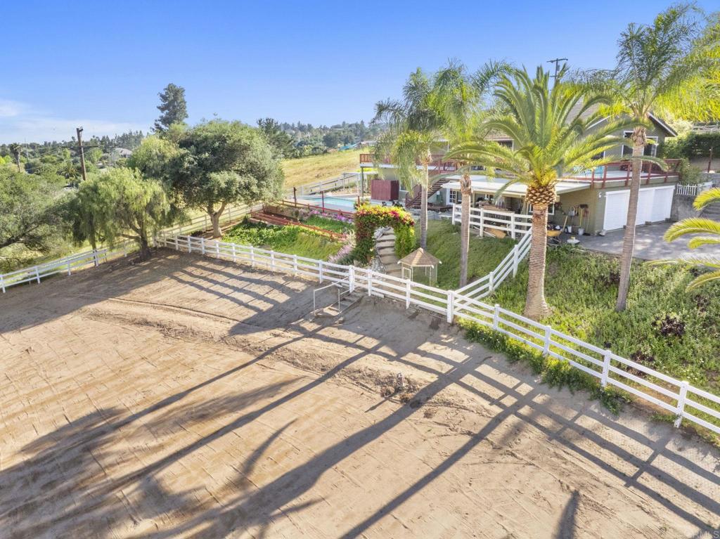 3223 Olive Hill Road Fallbrook, CA 92028 - Photo 3 of 64 a view of a house with a backyard