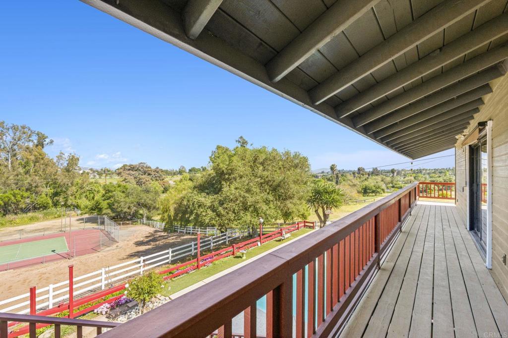 3223 Olive Hill Road Fallbrook, CA 92028 - Photo 38 of 64 a view of balcony with wooden floor and fence