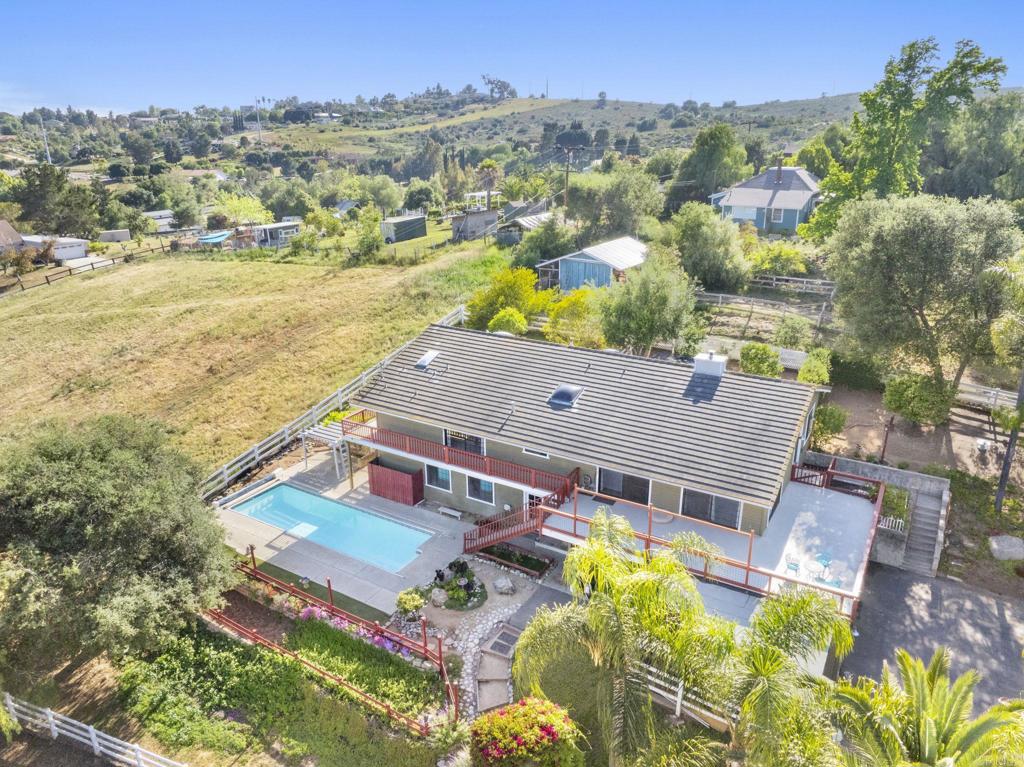 3223 Olive Hill Road Fallbrook, CA 92028 - Photo 43 of 64 an aerial view of residential houses with outdoor space and ocean view