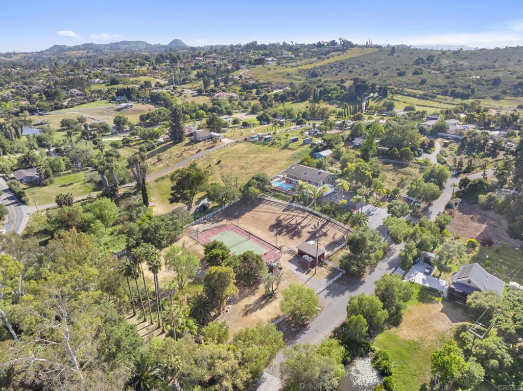 3223 Olive Hill Road Fallbrook, CA 92028 - Photo 44 of 64 an aerial view of residential house with parking and trees
