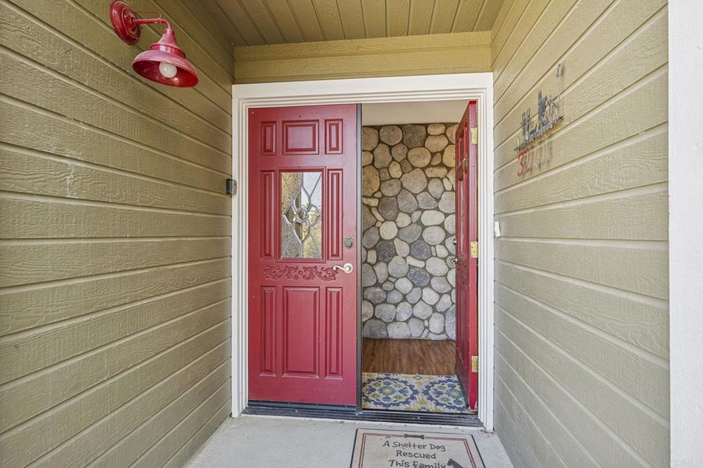 3223 Olive Hill Road Fallbrook, CA 92028 - Photo 56 of 64 a view of front door with a red door