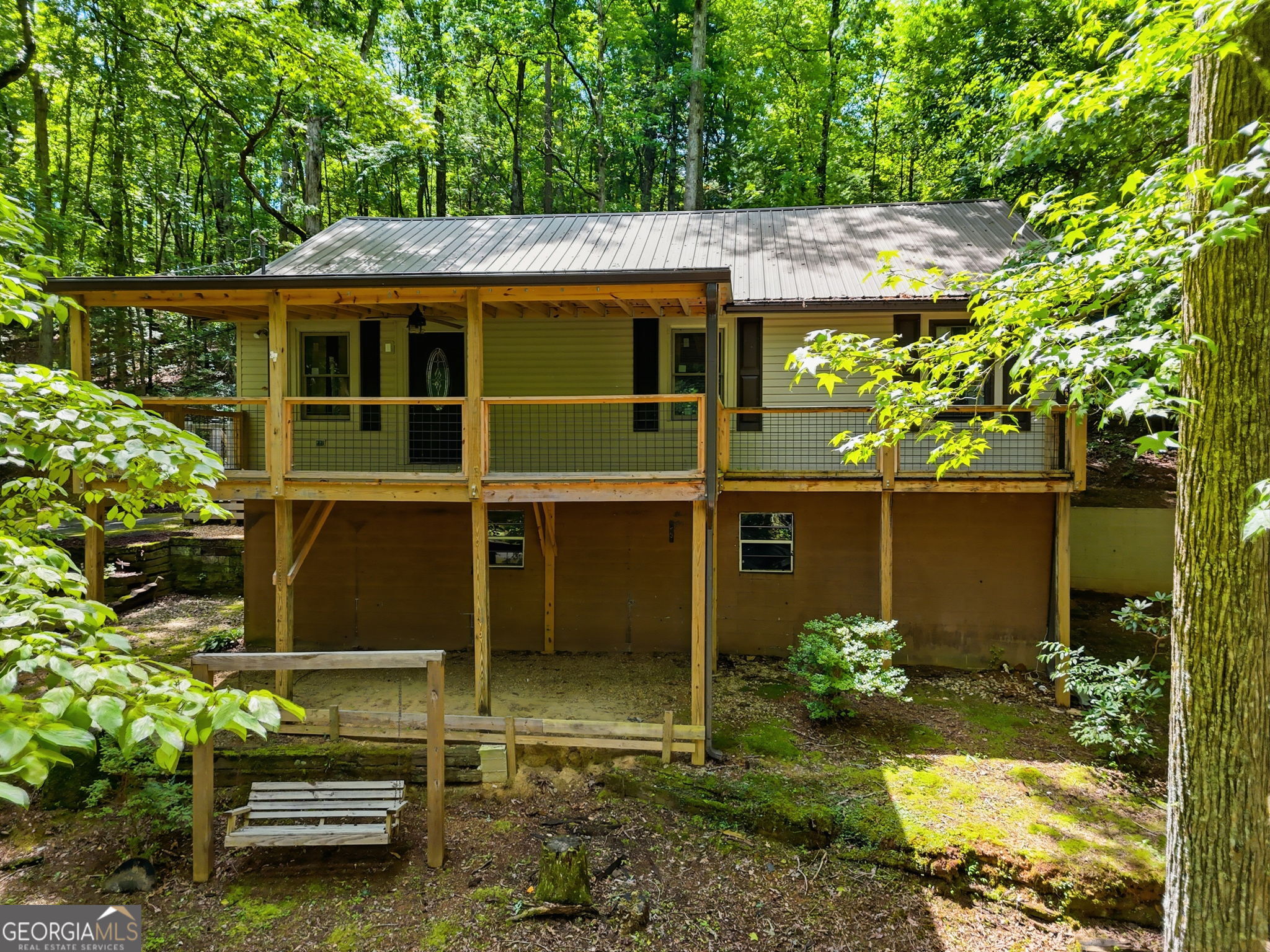 629 Goose Island Road Cherry Log, GA 30522 - Photo 2 of 52 a view of a house with a yard plants and large tree