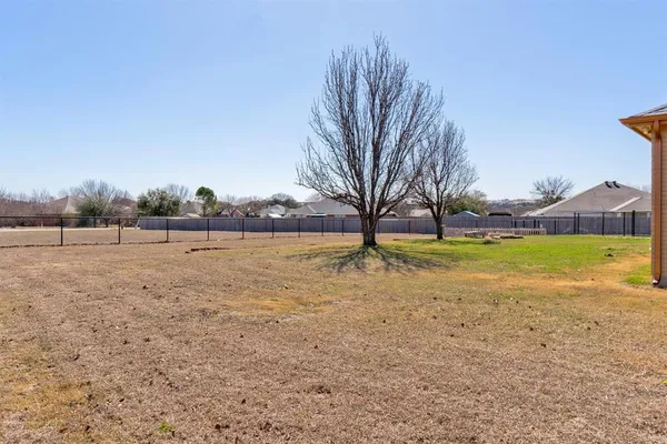 a view of house with garage