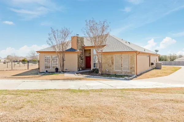 a view of a house with a yard and a sink