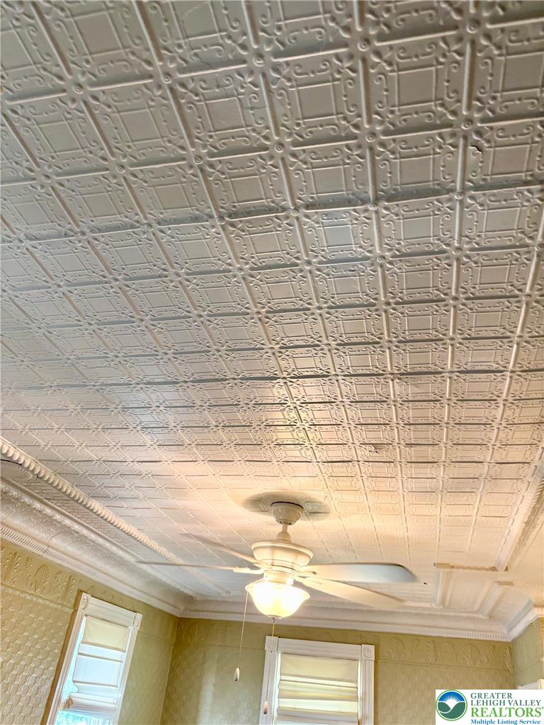 7241 Decatur Street New Tripoli, PA 18066 - Photo 9 of 36 Ornate pressed tin ceiling with a classic white finish brings a distinctive vintage touch to any room.