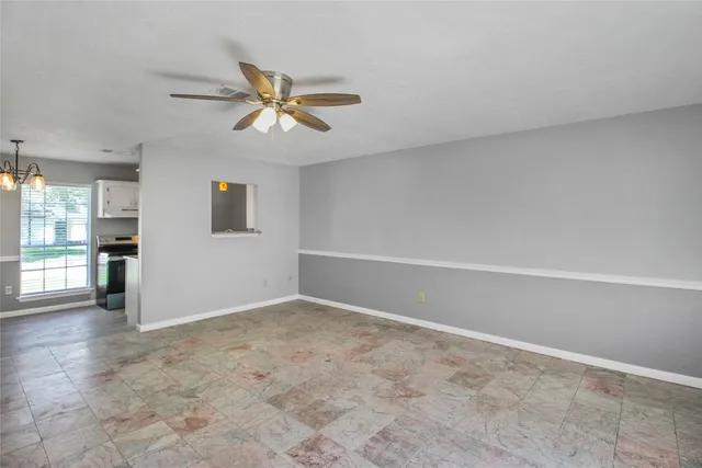 a view of an empty room and window