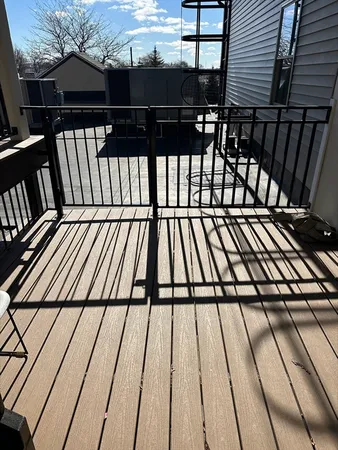 a view of outdoor space with deck and patio