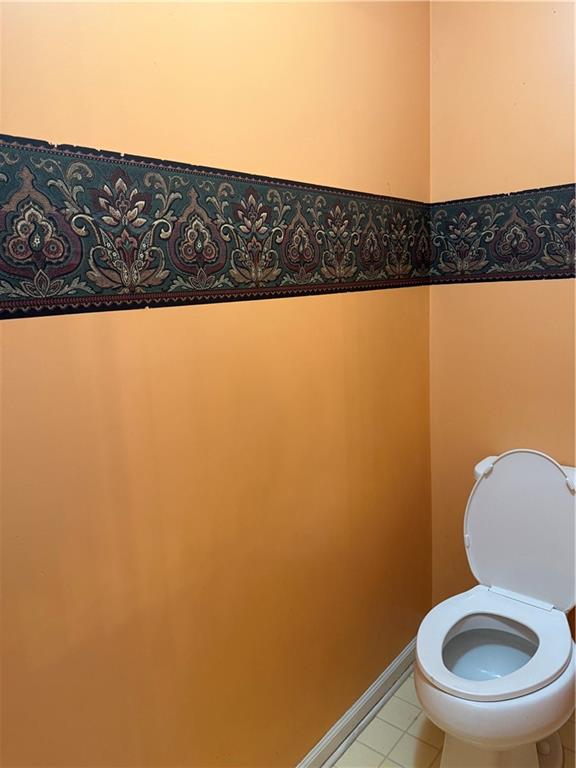 682 Bridge Way Lithonia, GA 30058 - Photo 16 of 25 a bathroom with a toilet and a sink