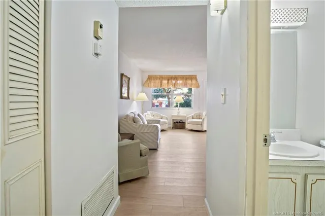 a living room with furniture and a gate