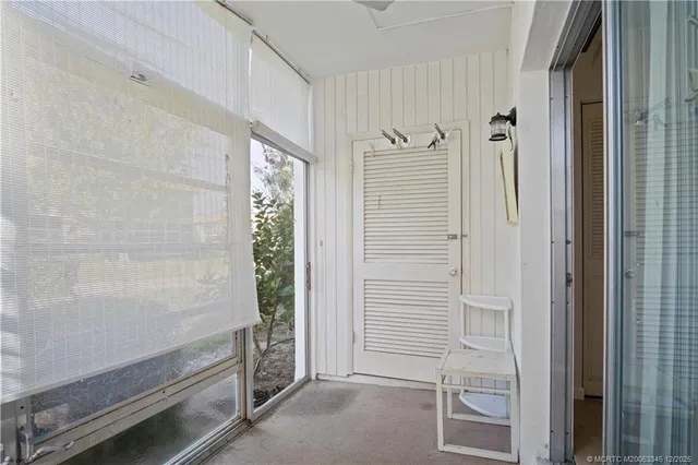 a bathroom with a shower and a sink