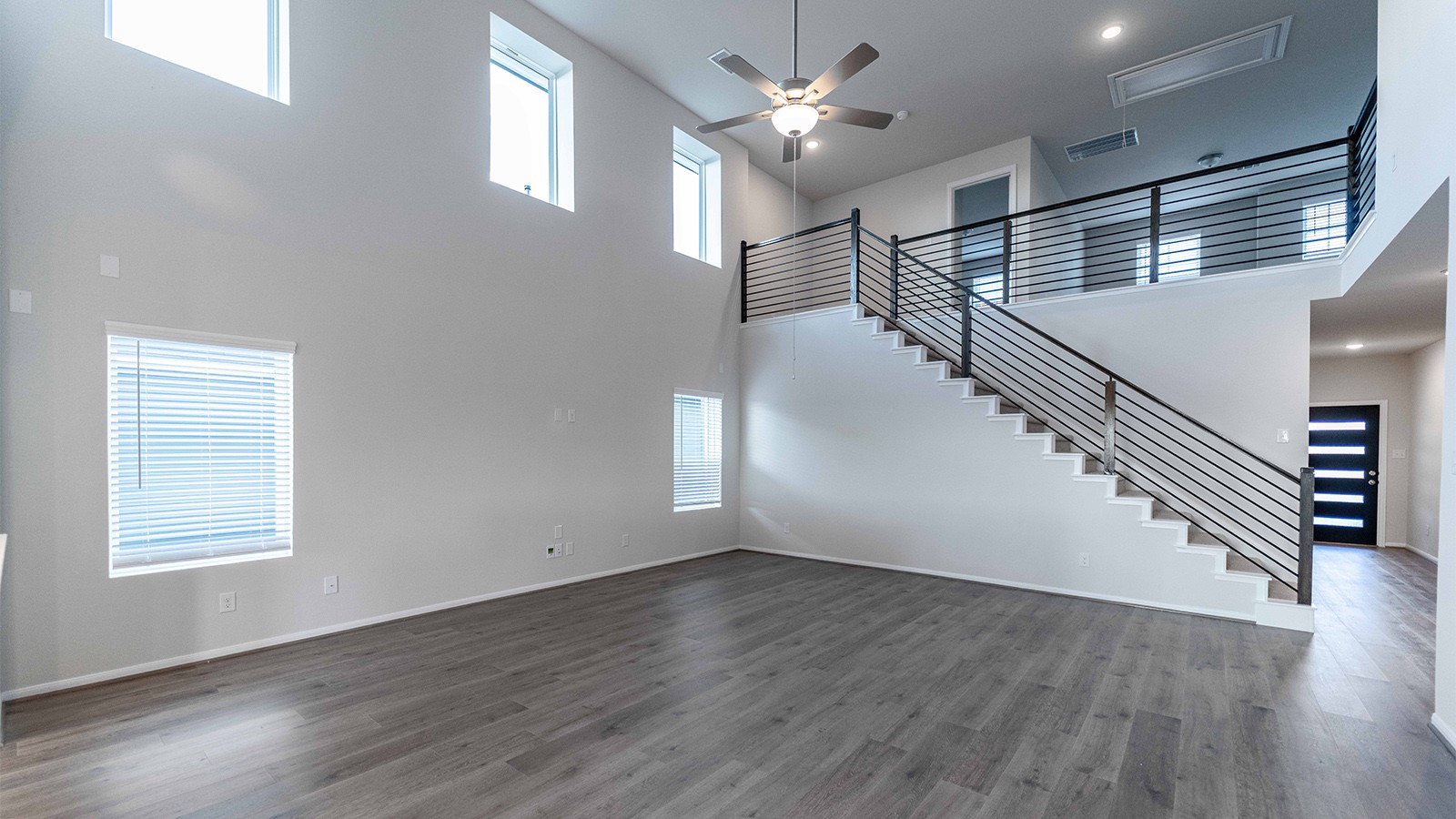 280 Yosemite Drive Kyle, TX 78640 - Photo 13 of 18 a view of entryway and hall with wooden floor