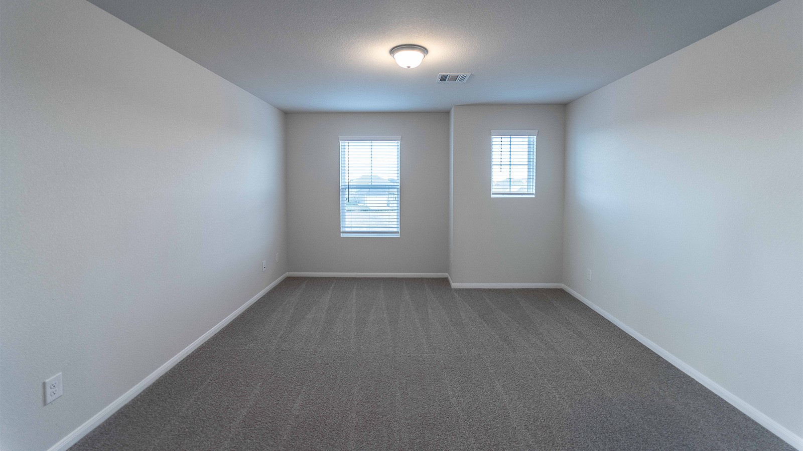 280 Yosemite Drive Kyle, TX 78640 - Photo 4 of 18 an empty room with windows