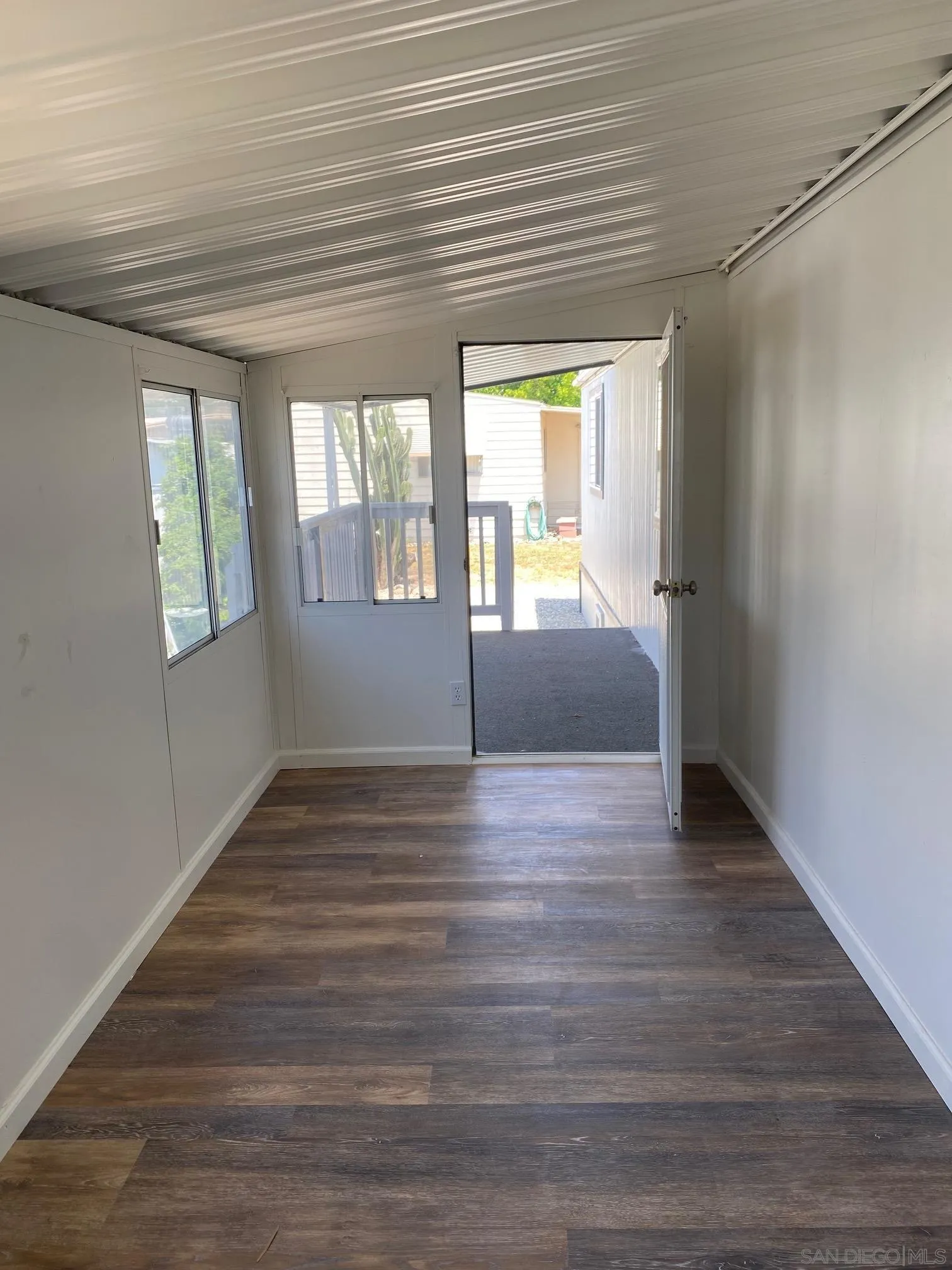 6480 Katherine Road, Unit 88 Simi Valley, CA 93063 - Photo 3 of 15 a view of an empty room and window