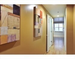 170 Tremont Street, Unit 606 Boston, MA 02111 - Photo 14 of 19 a bathroom with a glass door shower and a sink