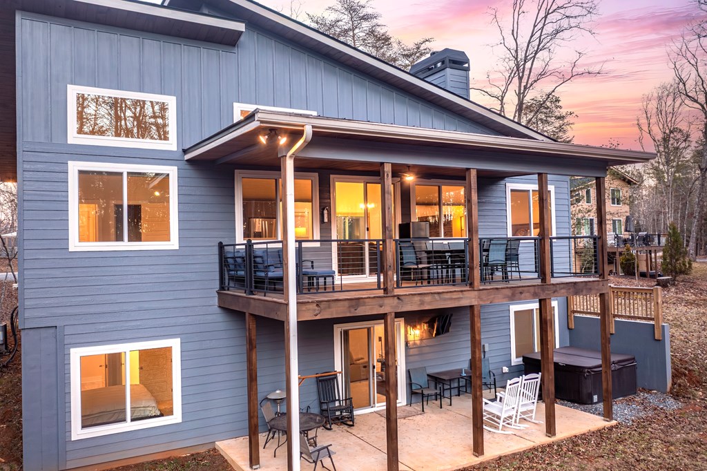1001 Sunset Road Epworth, GA 30541 - Photo 30 of 36 a view of a house with wooden deck and furniture