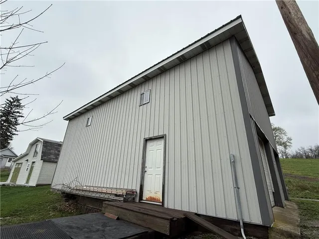 a house view with a backyard