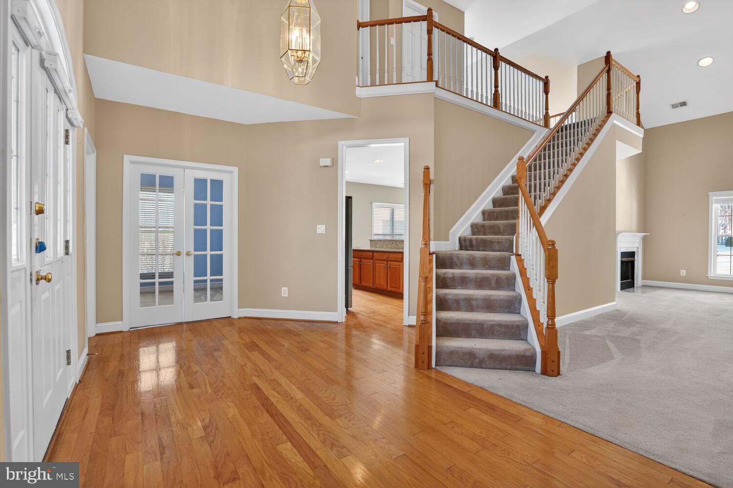 6767 Derby Run Way Gainesville, VA 20155 - Photo 23 of 37 a view of entryway and hall with wooden floor