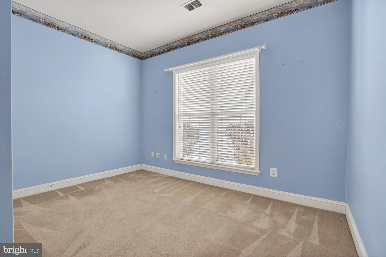6767 Derby Run Way Gainesville, VA 20155 - Photo 24 of 37 a view of an empty room with a window