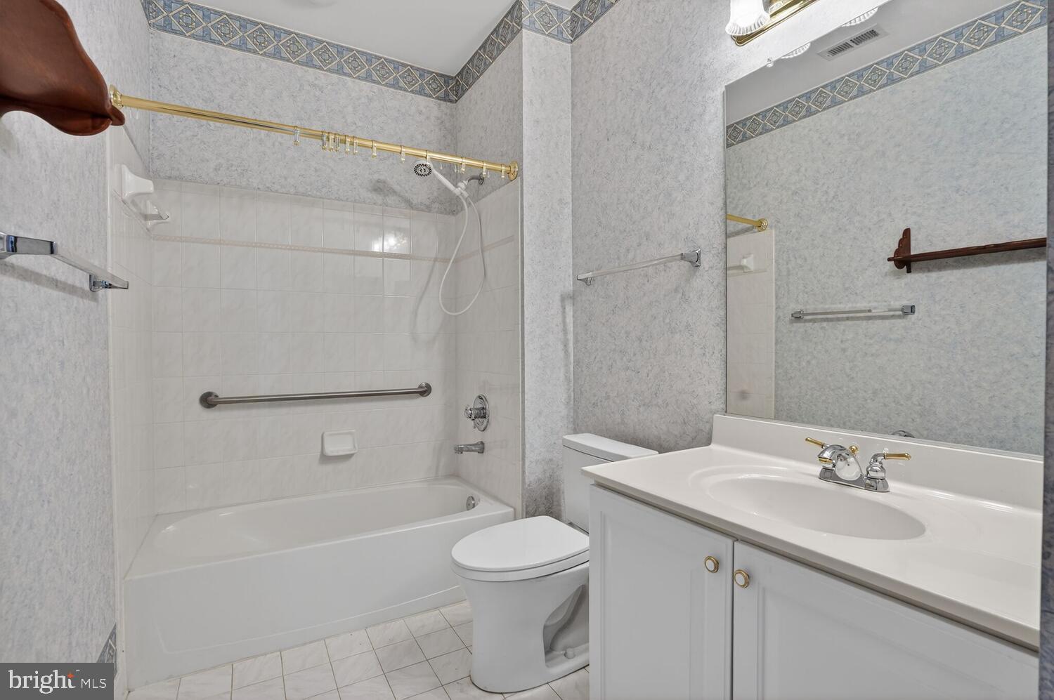 6767 Derby Run Way Gainesville, VA 20155 - Photo 25 of 37 a bathroom with a sink toilet and shower